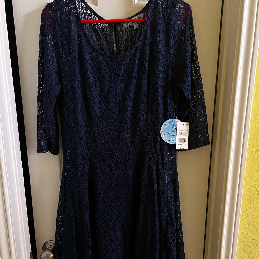 Dark Blue Lacy Dress with tags on it